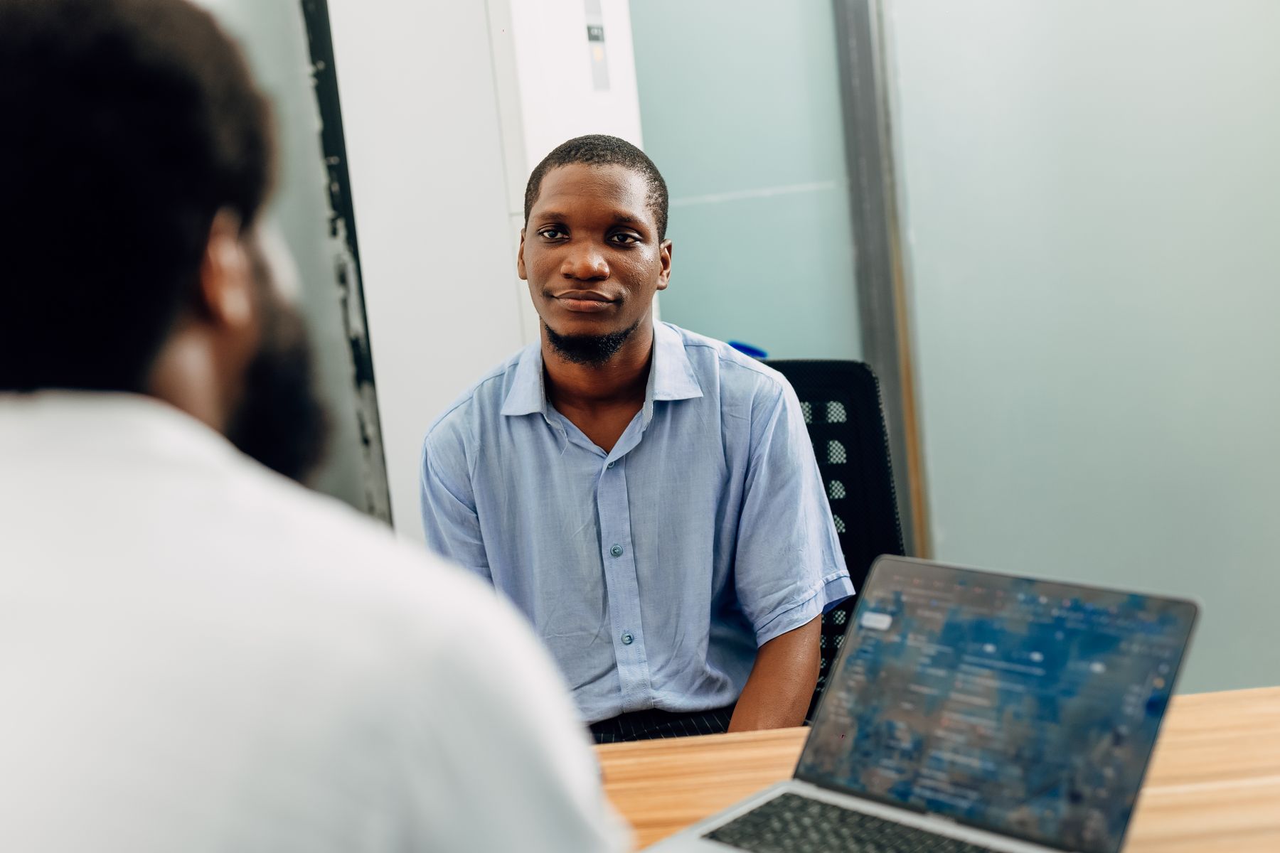 Nigerian professionals in a business discussion